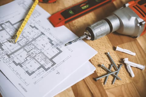 Floor plans with a level and drill
